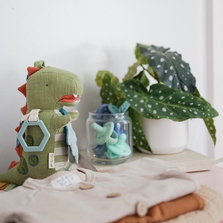 Peluche d’activité avec anneau de dentition Dino